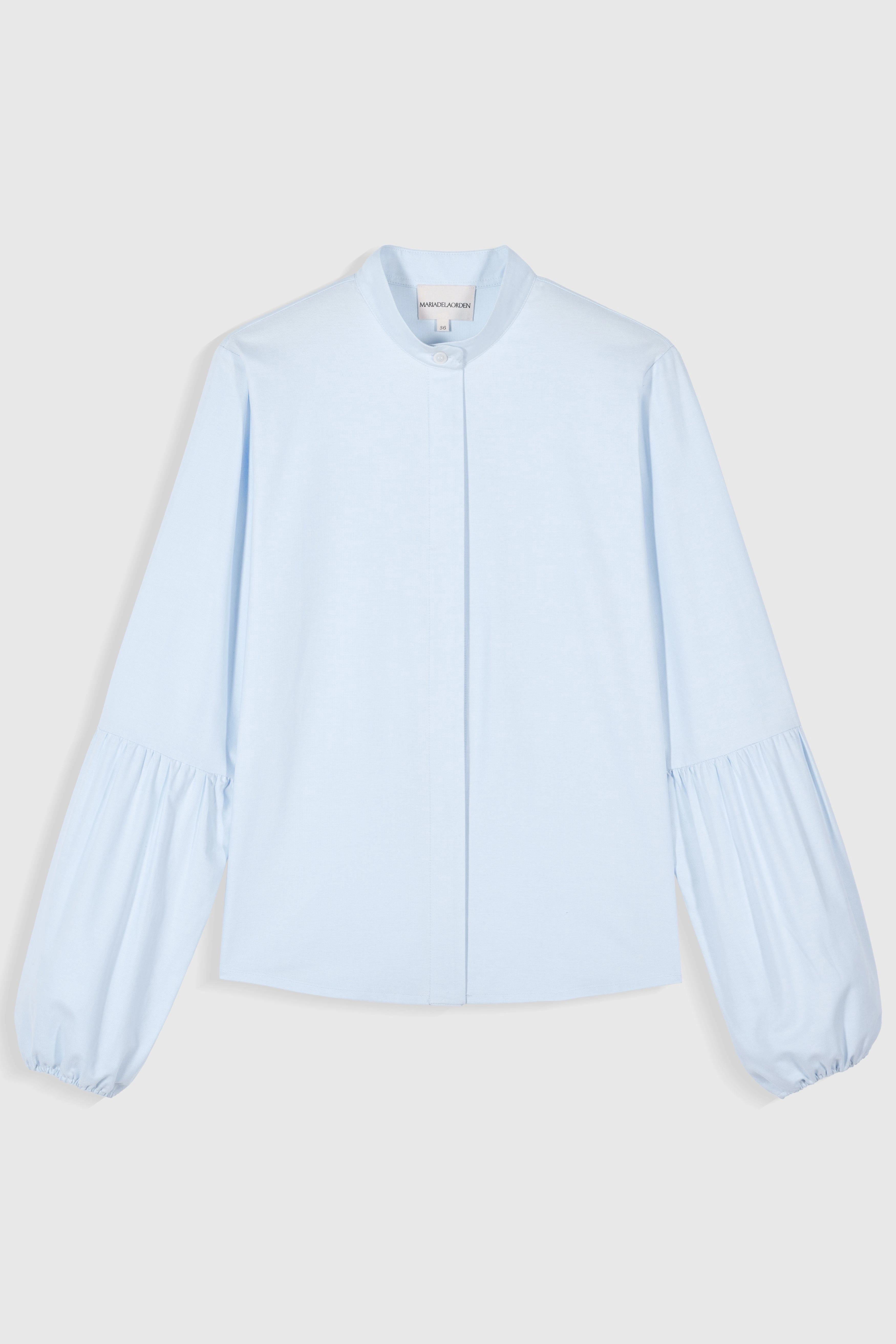 Bella's Breeze: Effortless Chic Shirt for Sunny Days.
